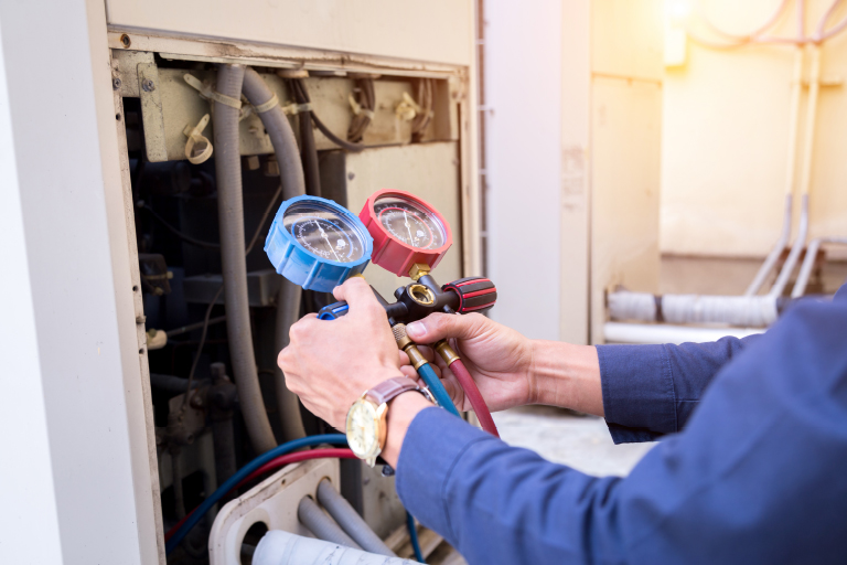 Boiler repair specialist working on a Chicago building heating system